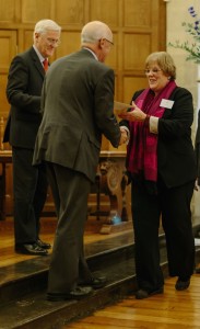 Dr Lynn Robson receives her award from the Vice Chancellor, Prof Andrew Hamilton