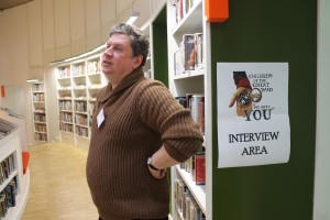 Waiting for the participants Man by open door